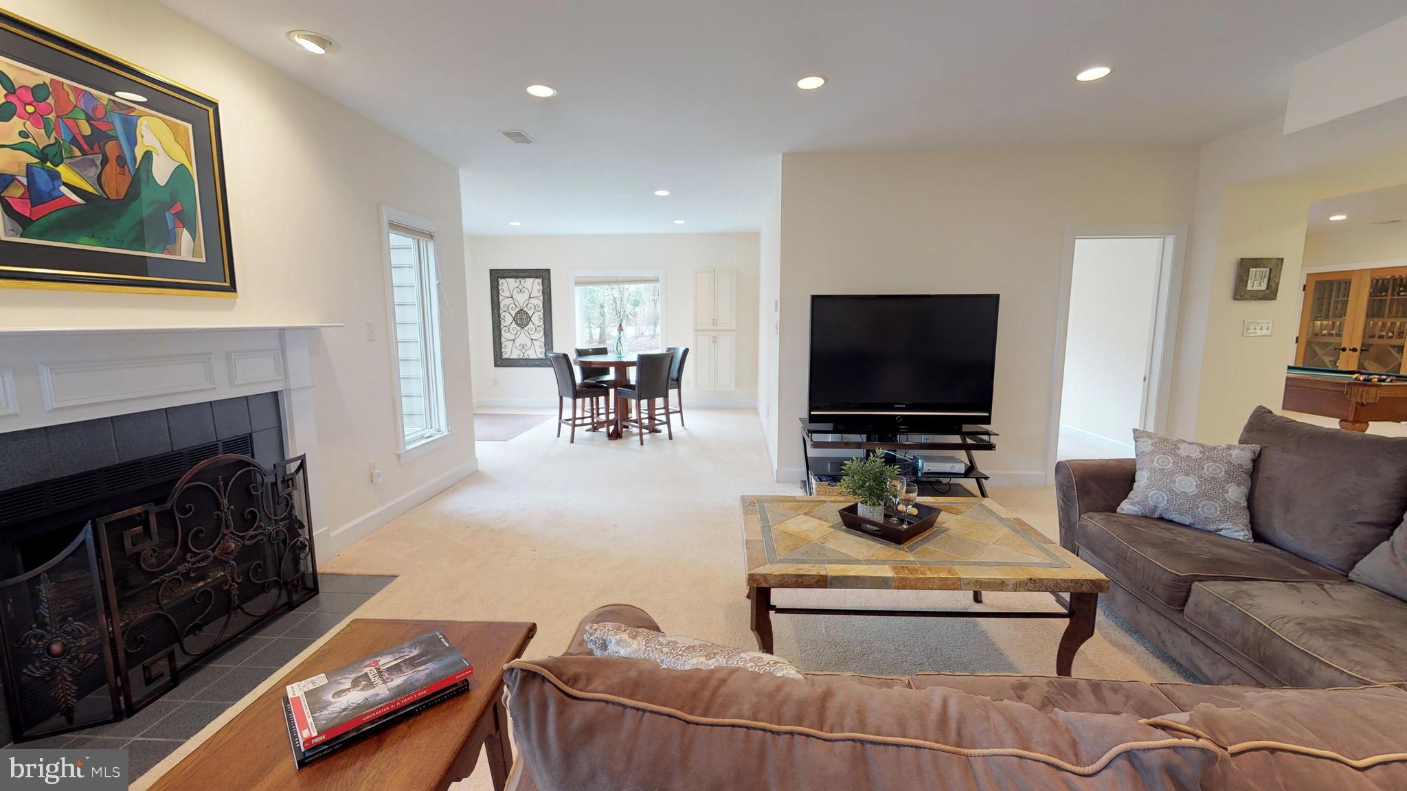 11205 Bright Pond Lane Reston, VA 20194 - Photo 52 of 102 Recreation Room has a fireplace, too!