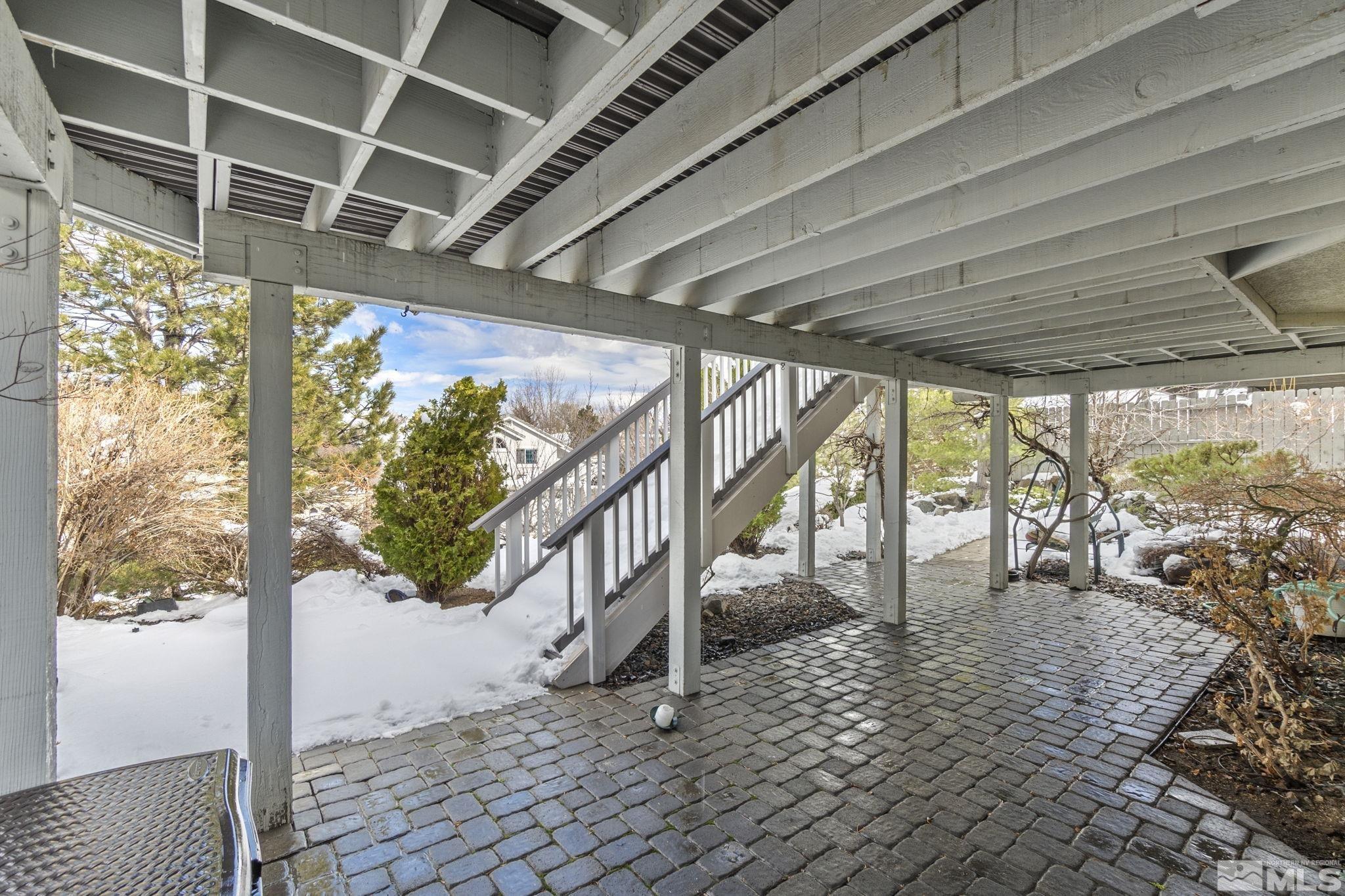 6075 Sunrise Meadows Loop Reno, NV 89519 - Photo 25 of 38 a view of a porch with wooden floor
