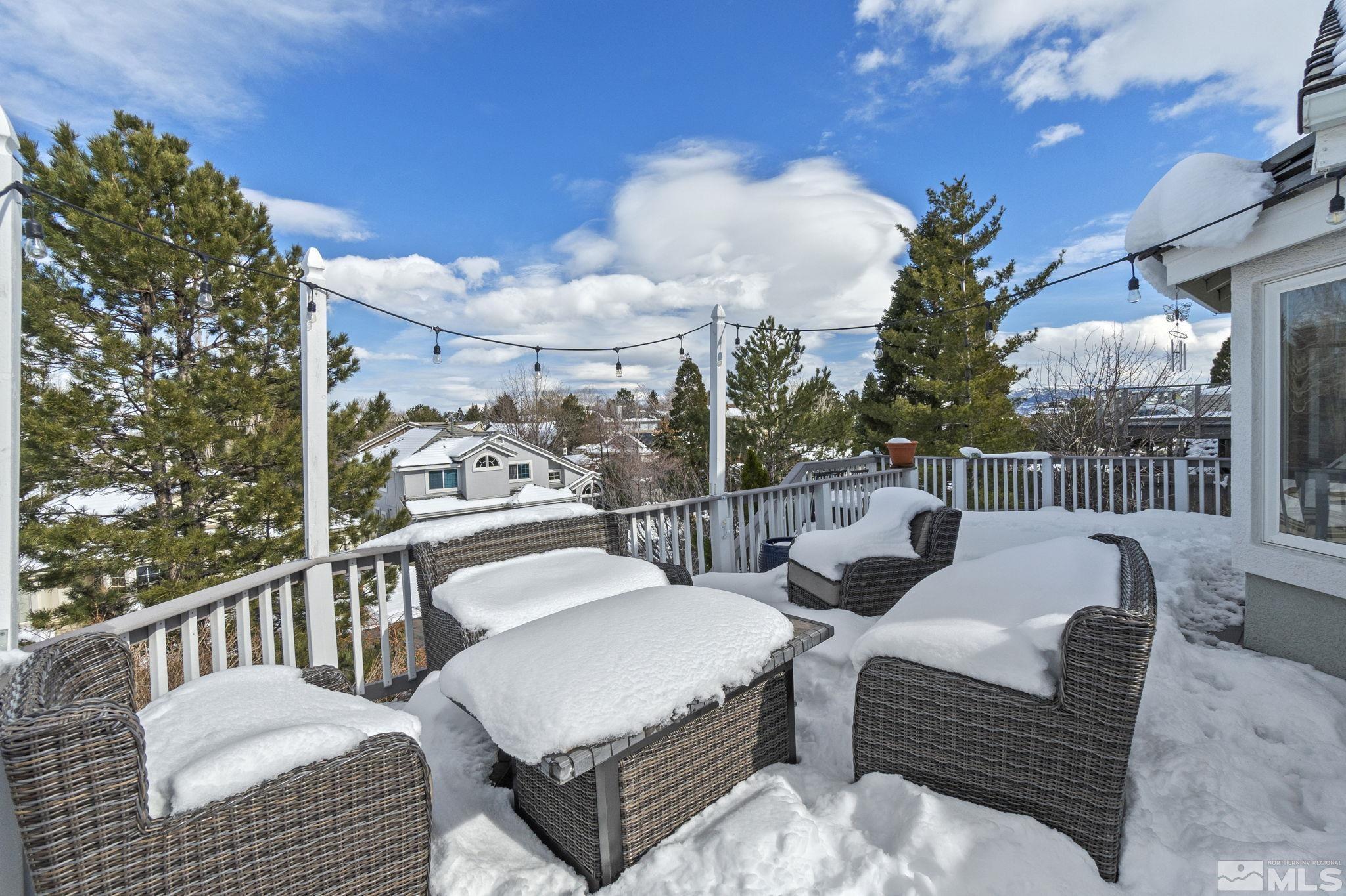 6075 Sunrise Meadows Loop Reno, NV 89519 - Photo 26 of 38 a view of a patio with couches and a table