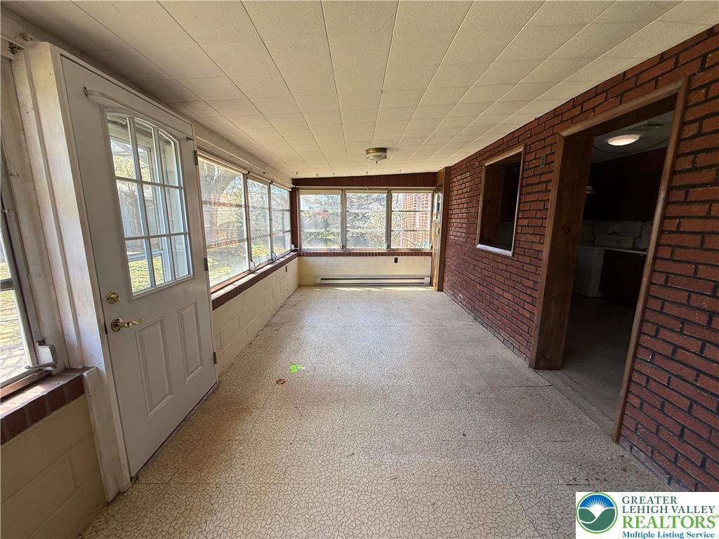 3124 Roxford Road Allentown, PA 18103 - Photo 14 of 23 a view of an empty room with a fireplace