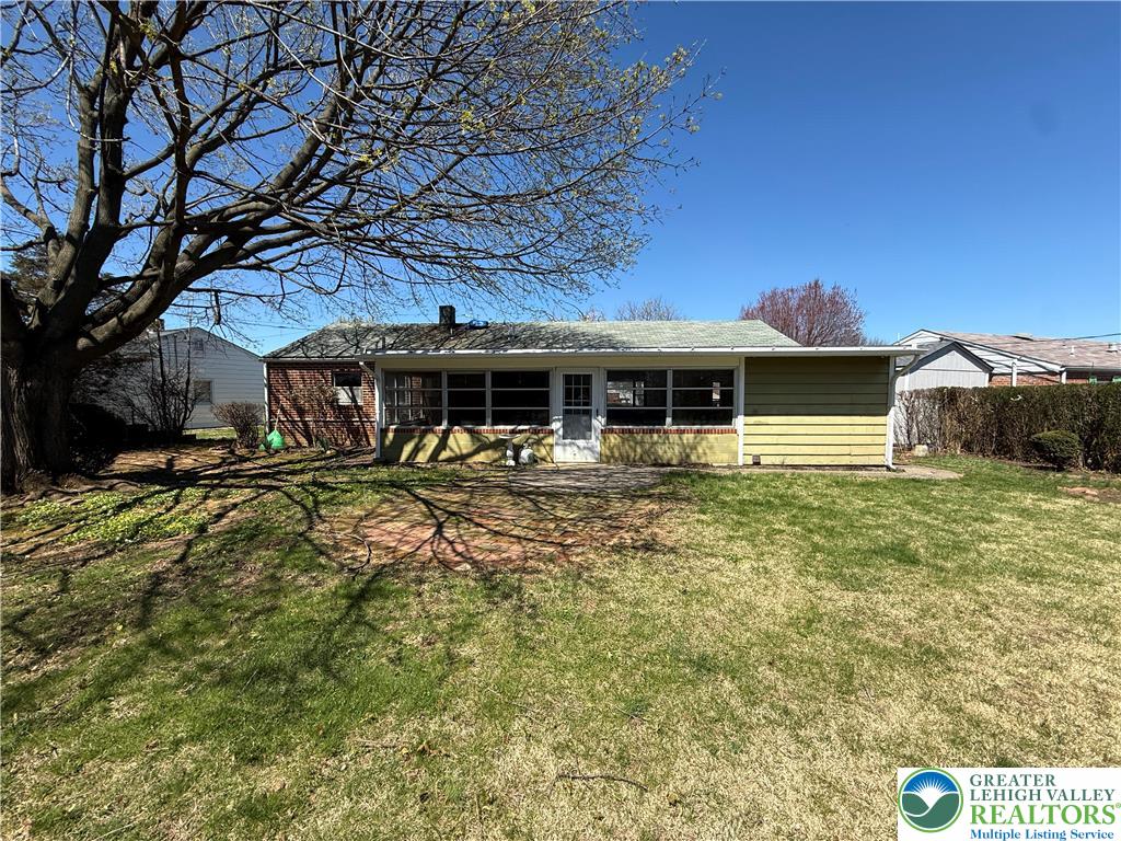 3124 Roxford Road Allentown, PA 18103 - Photo 19 of 23 a front view of a house with a garden