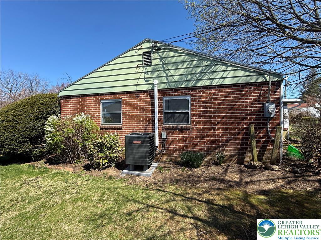 3124 Roxford Road Allentown, PA 18103 - Photo 21 of 23 a front view of a house with a yard