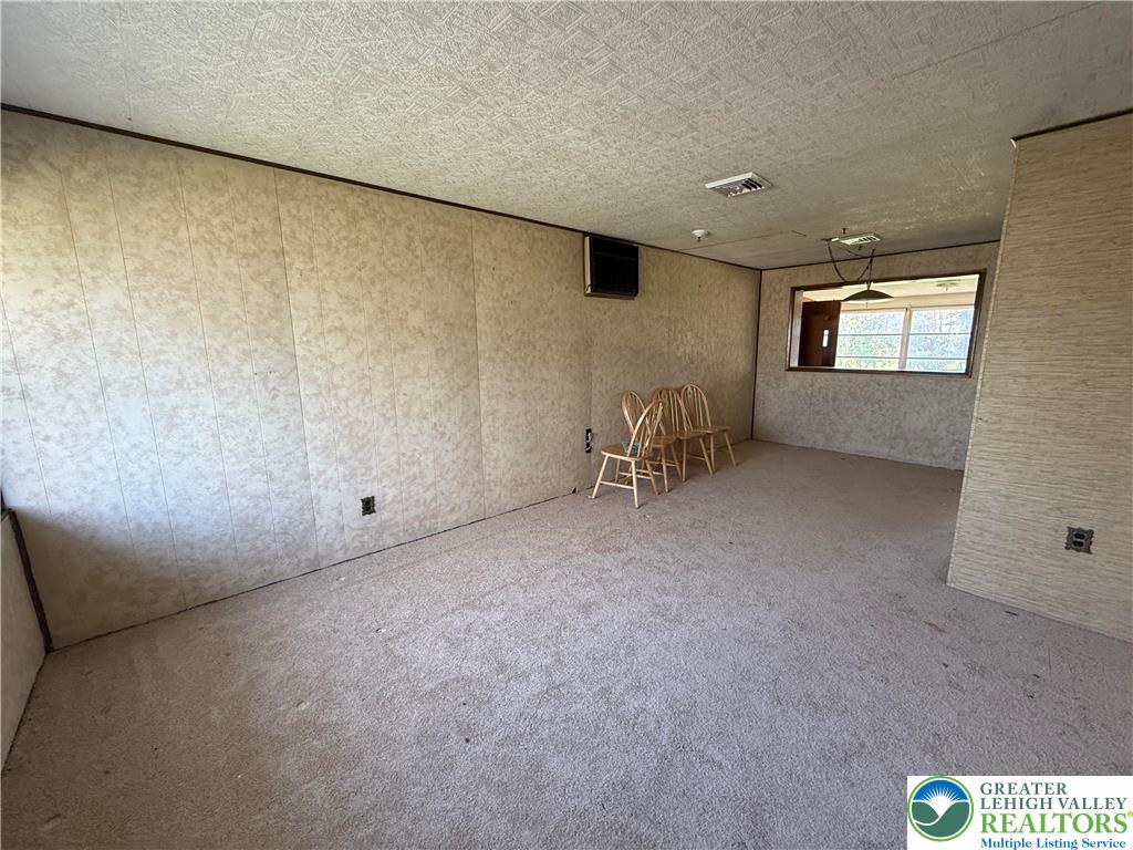 3124 Roxford Road Allentown, PA 18103 - Photo 5 of 23 a view of an empty room with a window