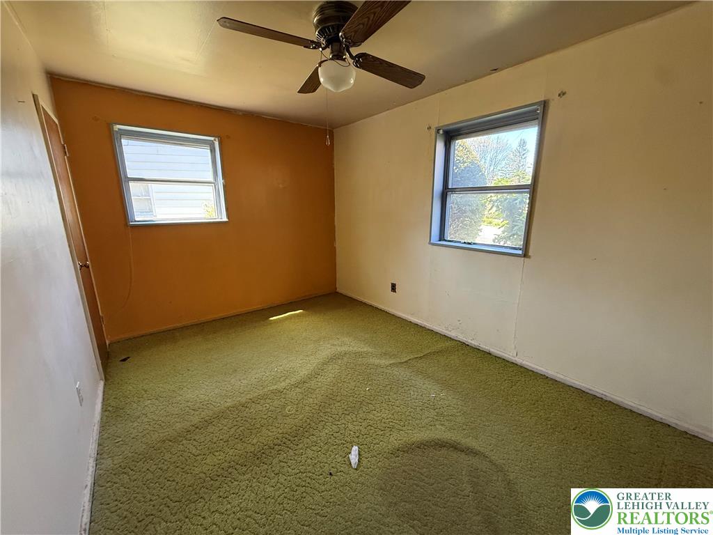 3124 Roxford Road Allentown, PA 18103 - Photo 10 of 23 a view of a big room with windows