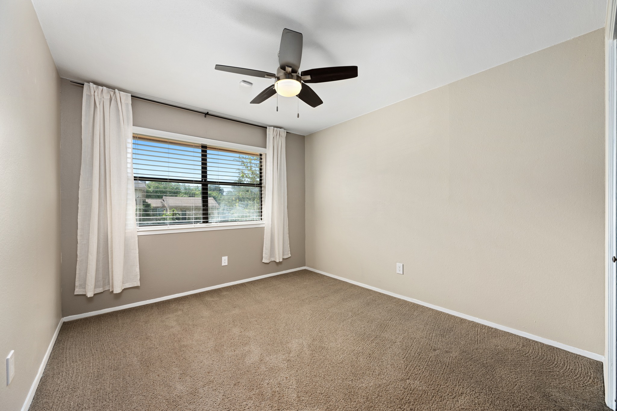 3908 Valley View Round Rock, TX 78681 - Photo 24 of 39 Upstairs bedroom two gives you an easy setup for guests or kids.
