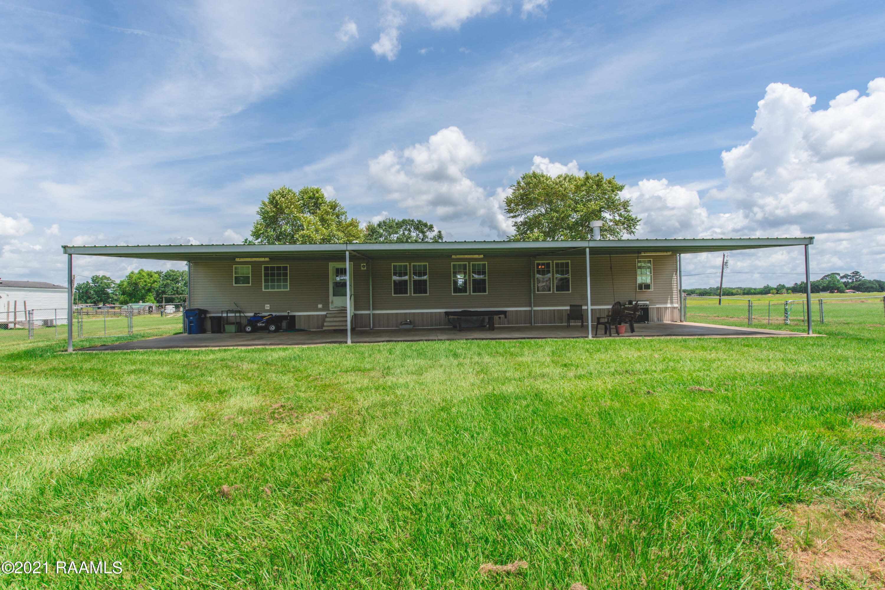 254 Lenora Road Church Point, LA 70525 - Photo 24 of 34 Large Carport/Patio