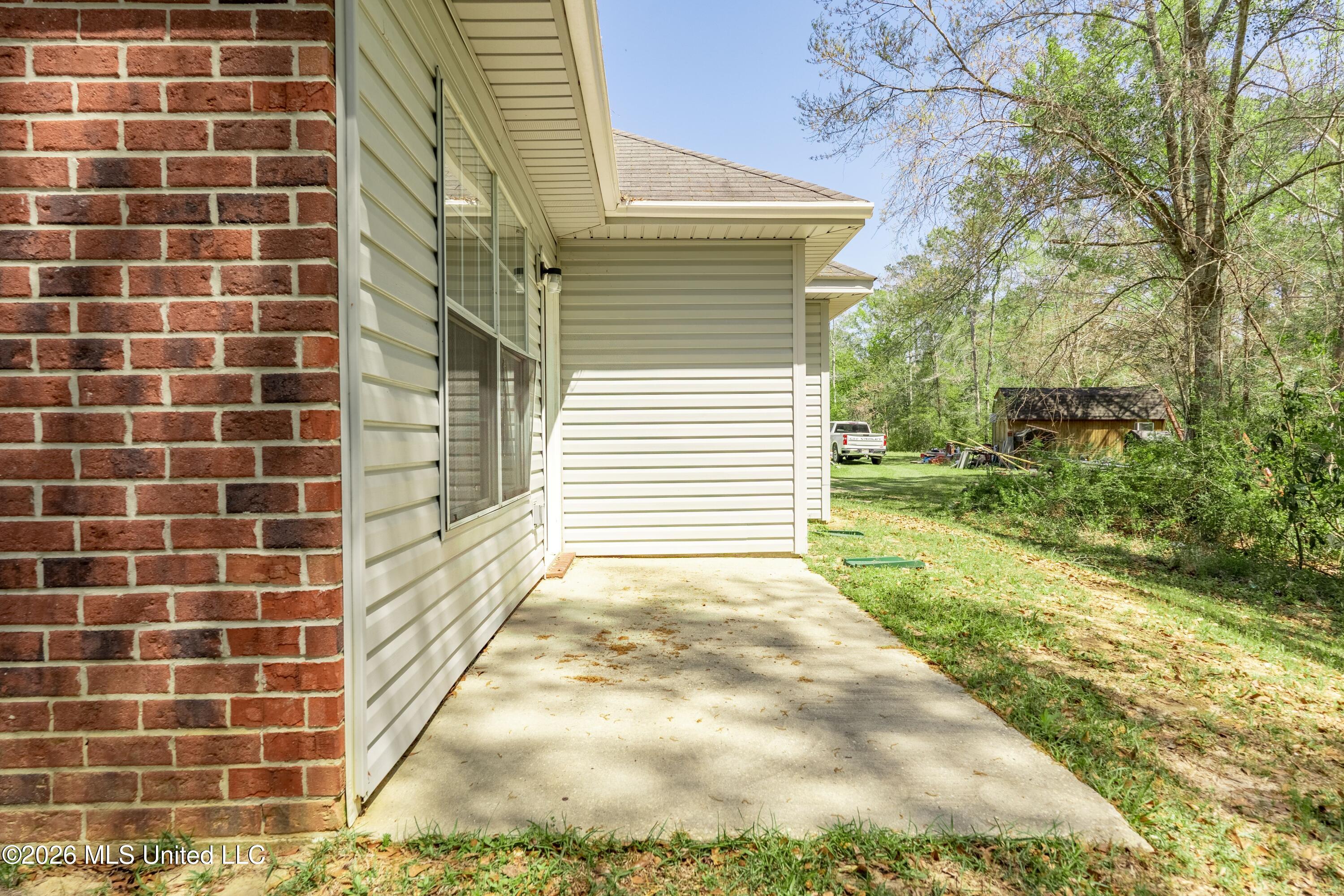 27 Maroon Drive Picayune, MS 39466 - Photo 27 of 40 back porch 2