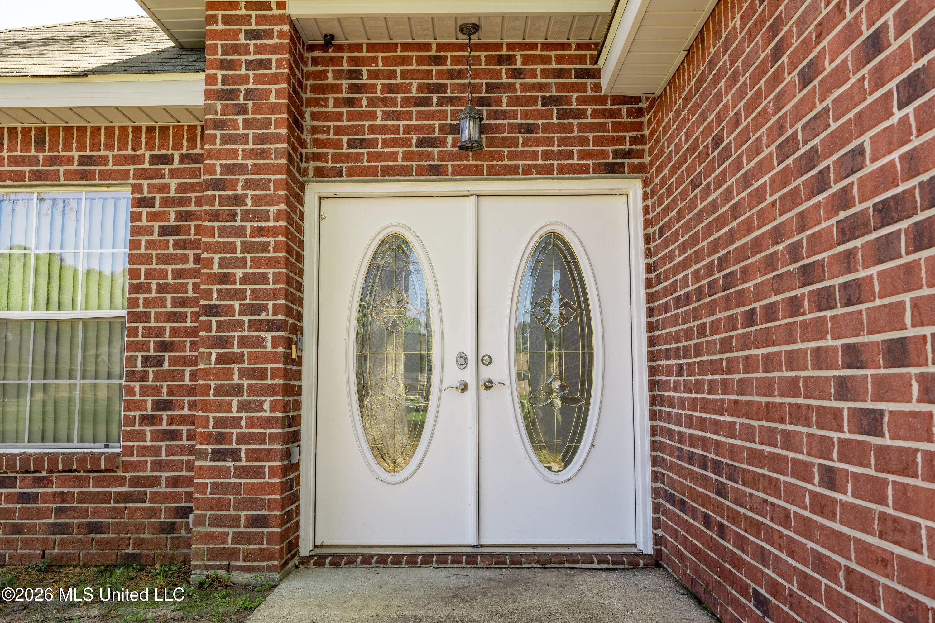 27 Maroon Drive Picayune, MS 39466 - Photo 3 of 40 front doors