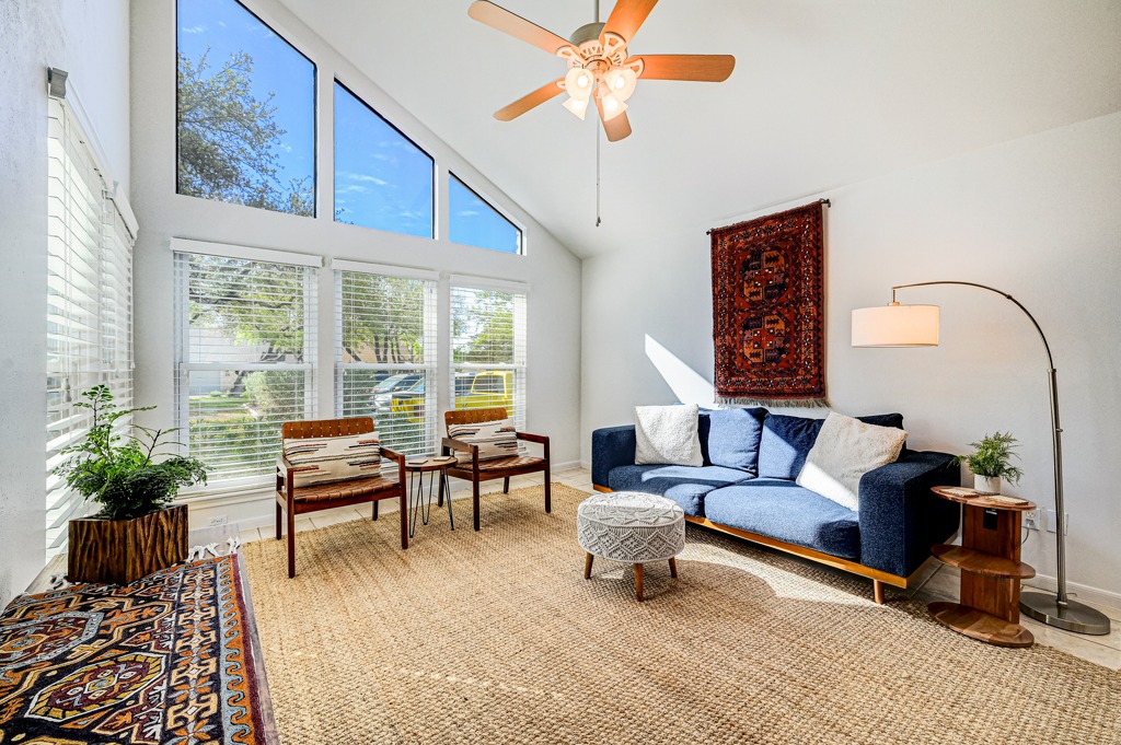 42 Cypress Point Wimberley, TX 78676 - Photo 5 of 30 a living room with furniture and a potted plant