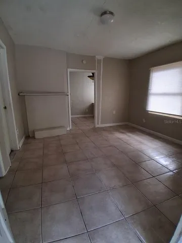 a view of a livingroom with a staircase