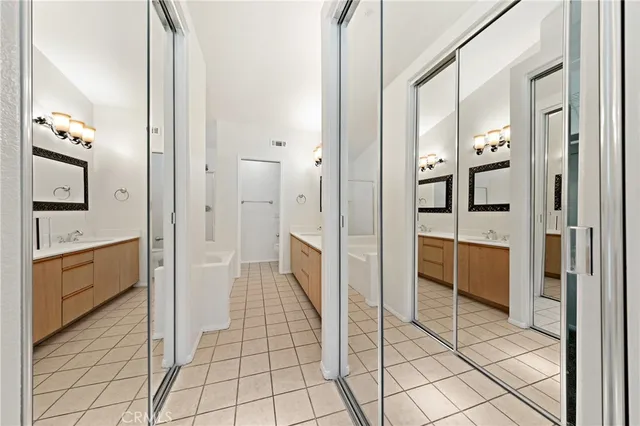 a bathroom with a bathtub and a sink