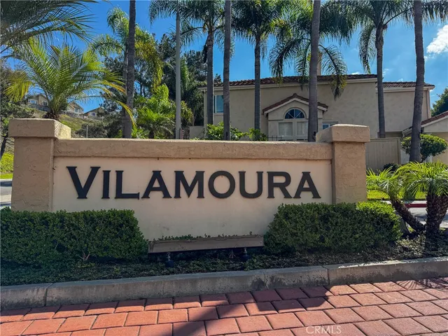 a sign broad in front of the house