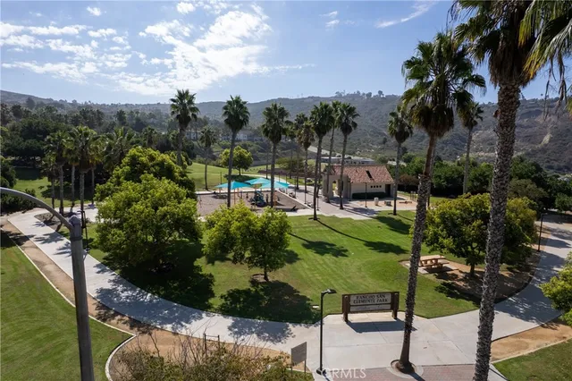 a view of multiple houses with a street