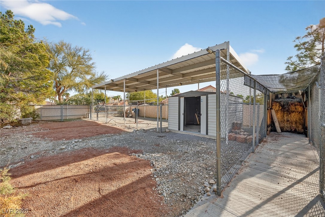 5935 North Campbell Road Las Vegas, NV 89149 - Photo 41 of 49 Covered RV Parking, Storage Shed, Archery Cage.