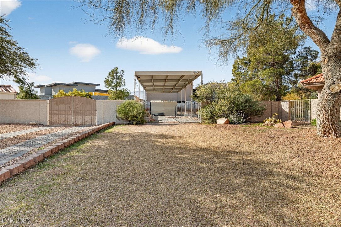 5935 North Campbell Road Las Vegas, NV 89149 - Photo 43 of 49 RV Parking Driveway and gate