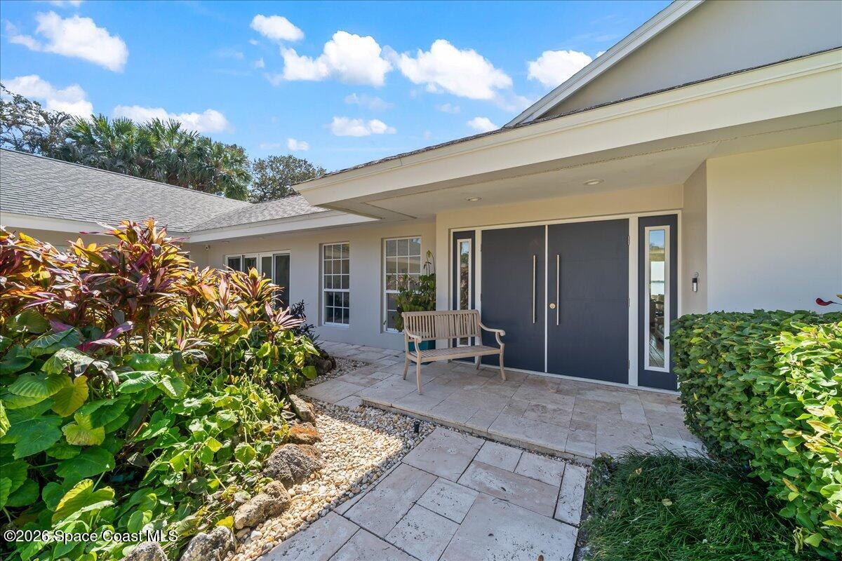 408 Riverside Drive Melbourne Beach, FL 32951 - Photo 3 of 12 Double Door Entry
