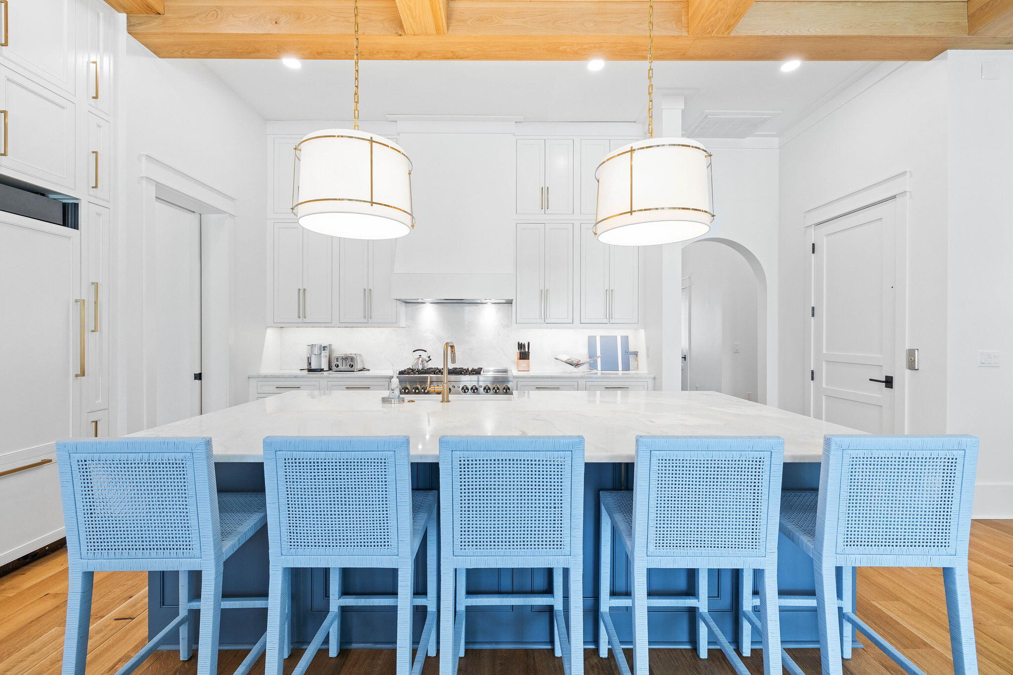 48 Paradise By The Sea Boulevard Inlet Beach, FL 32461 - Photo 24 of 97 a large kitchen with a dining table chairs and a chandelier