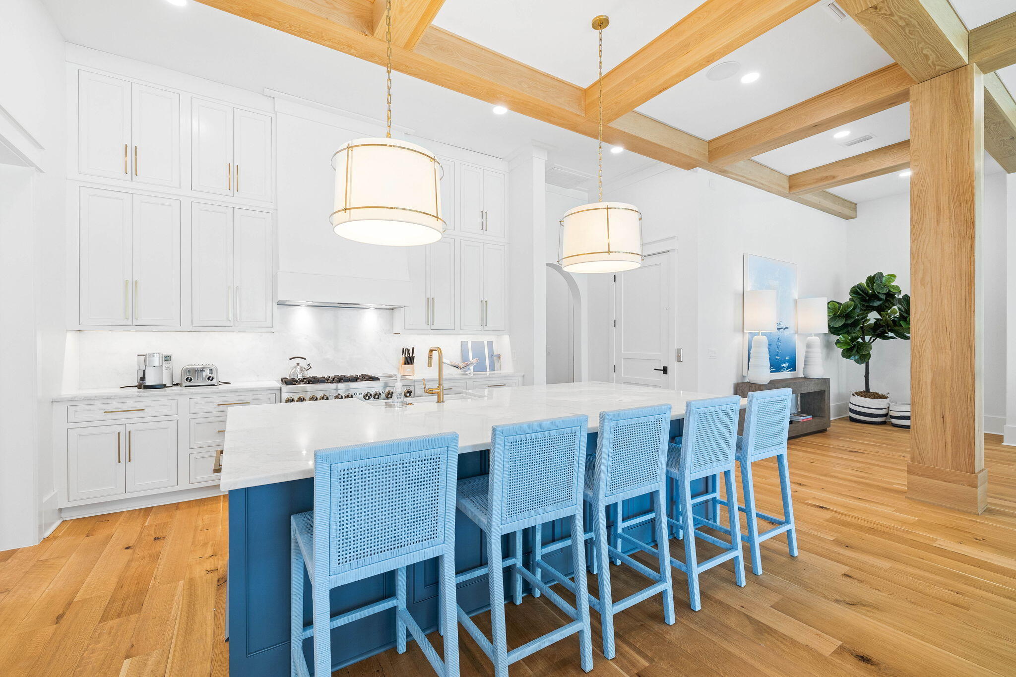 48 Paradise By The Sea Boulevard Inlet Beach, FL 32461 - Photo 26 of 97 a kitchen with stainless steel appliances a dining table chairs and wooden floor