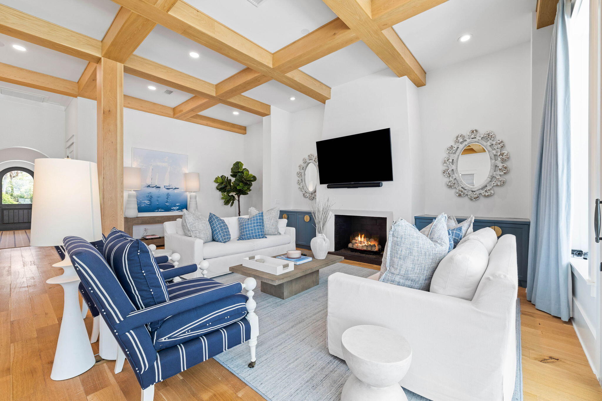 48 Paradise By The Sea Boulevard Inlet Beach, FL 32461 - Photo 35 of 97 a living room with furniture a fireplace and a flat screen tv