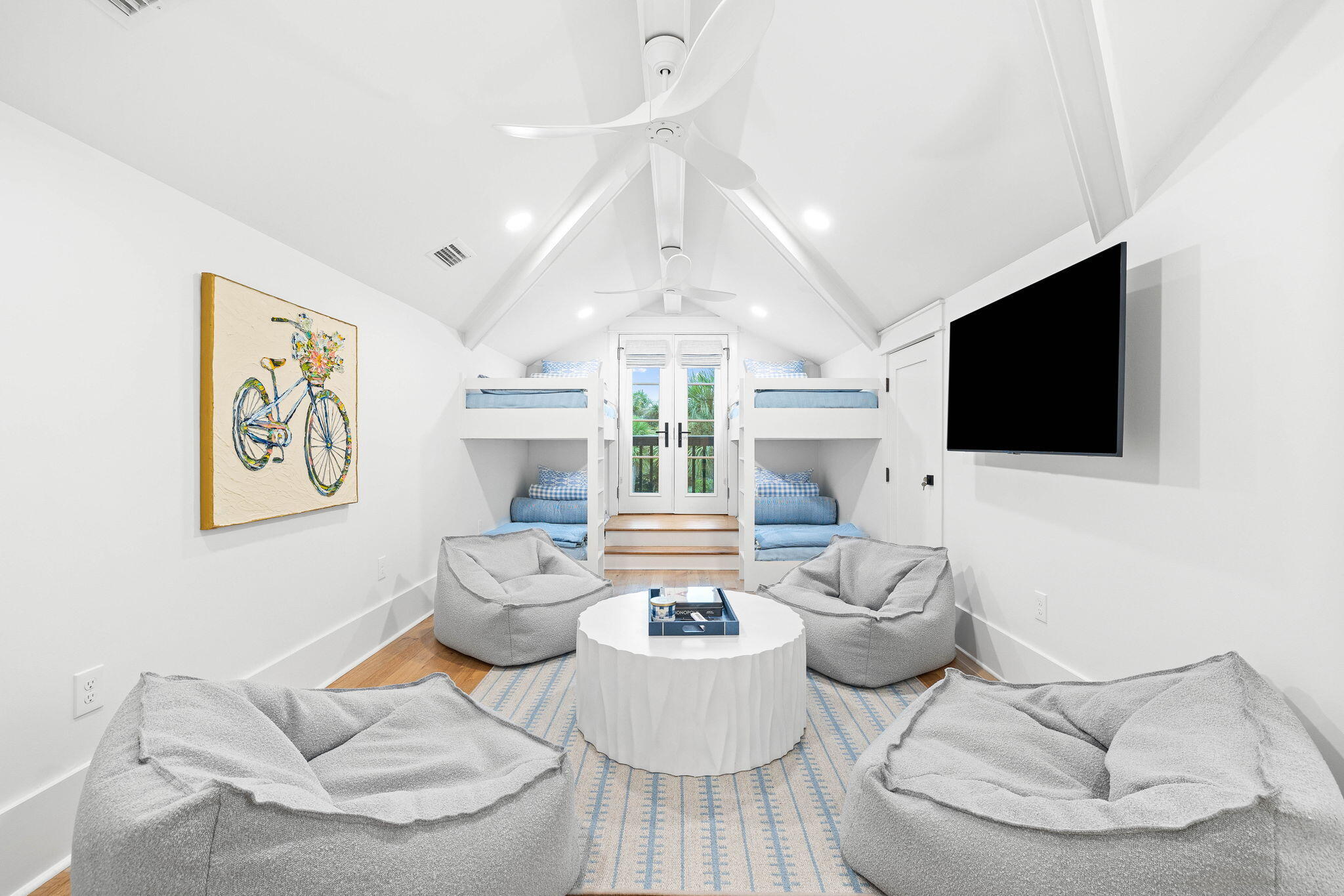 48 Paradise By The Sea Boulevard Inlet Beach, FL 32461 - Photo 50 of 97 a living room with furniture and a flat screen tv