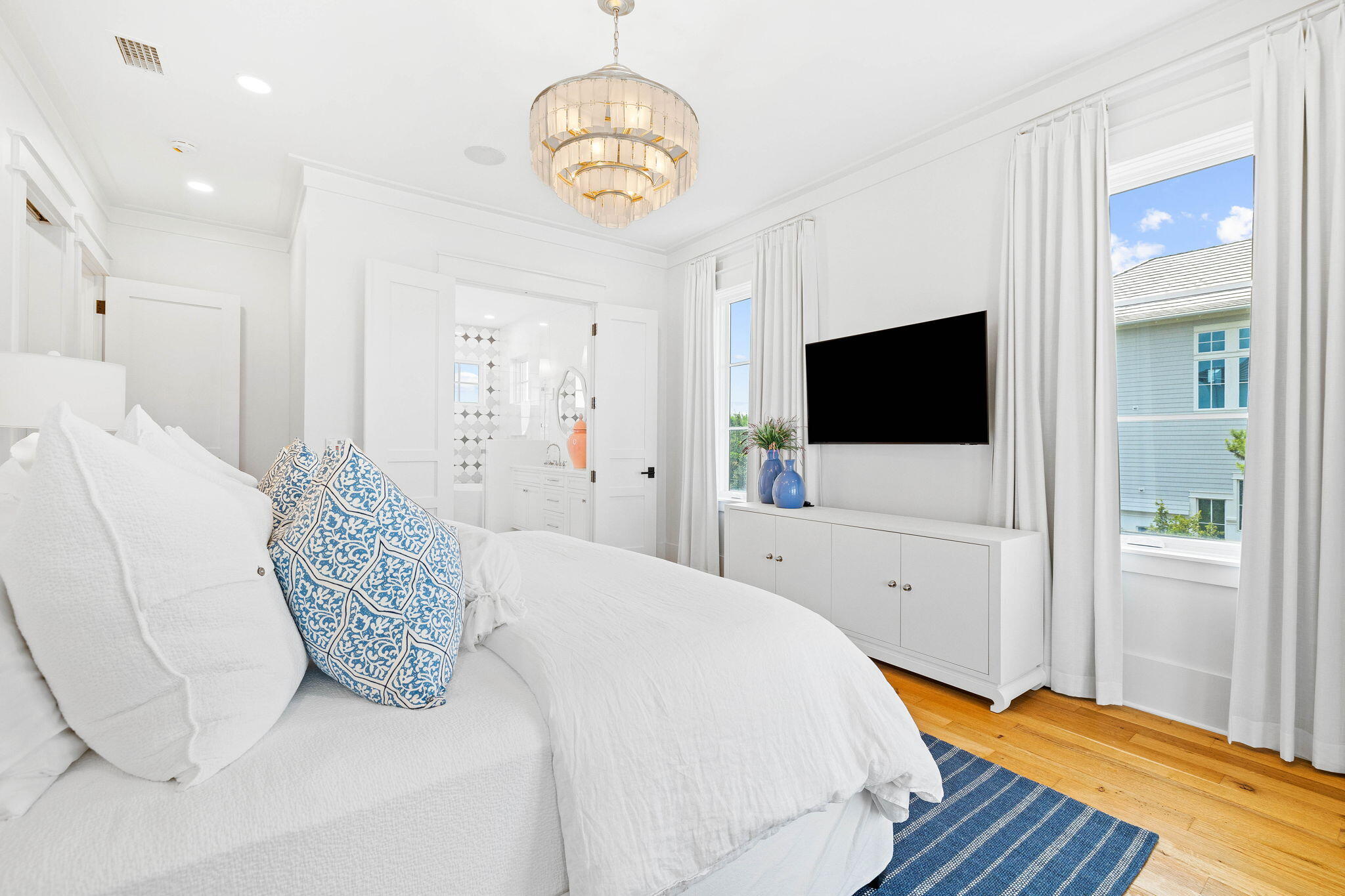 48 Paradise By The Sea Boulevard Inlet Beach, FL 32461 - Photo 62 of 97 a bedroom with a bed and a flat screen tv