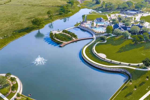 a view of swimming pool from a balcony