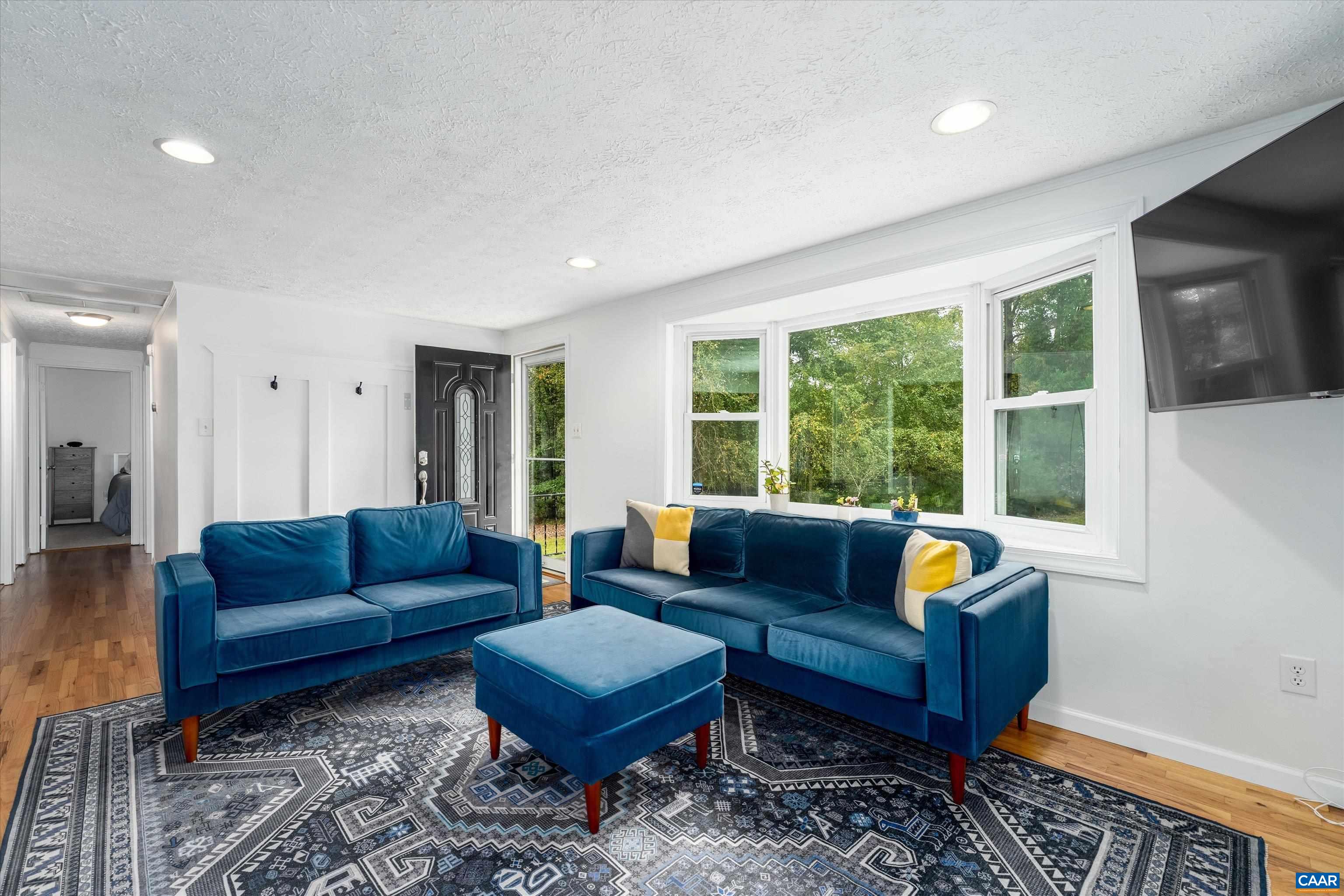 2833 Milton Road Charlottesville, VA 22902 - Photo 14 of 44 a living room with furniture and a large window