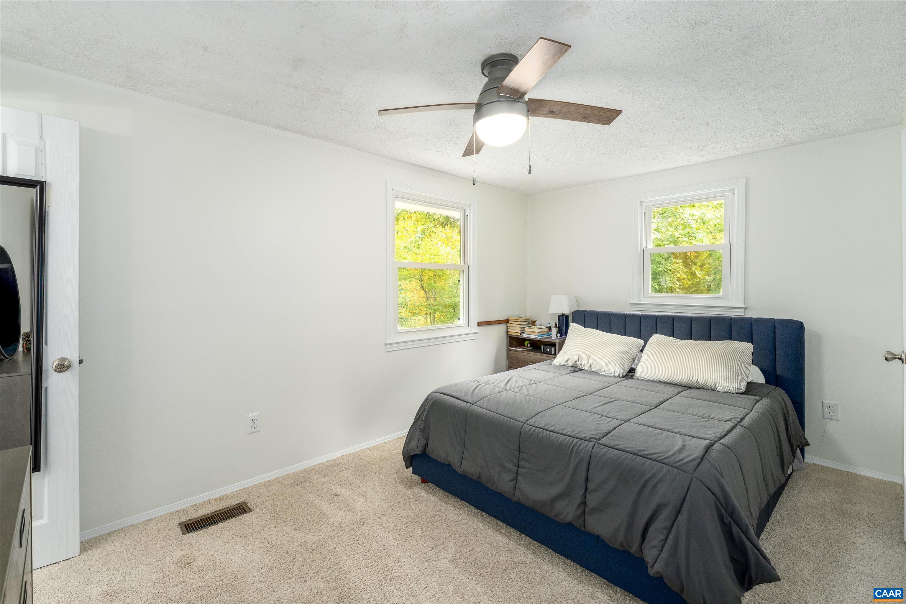 2833 Milton Road Charlottesville, VA 22902 - Photo 20 of 44 a bedroom with a bed and window