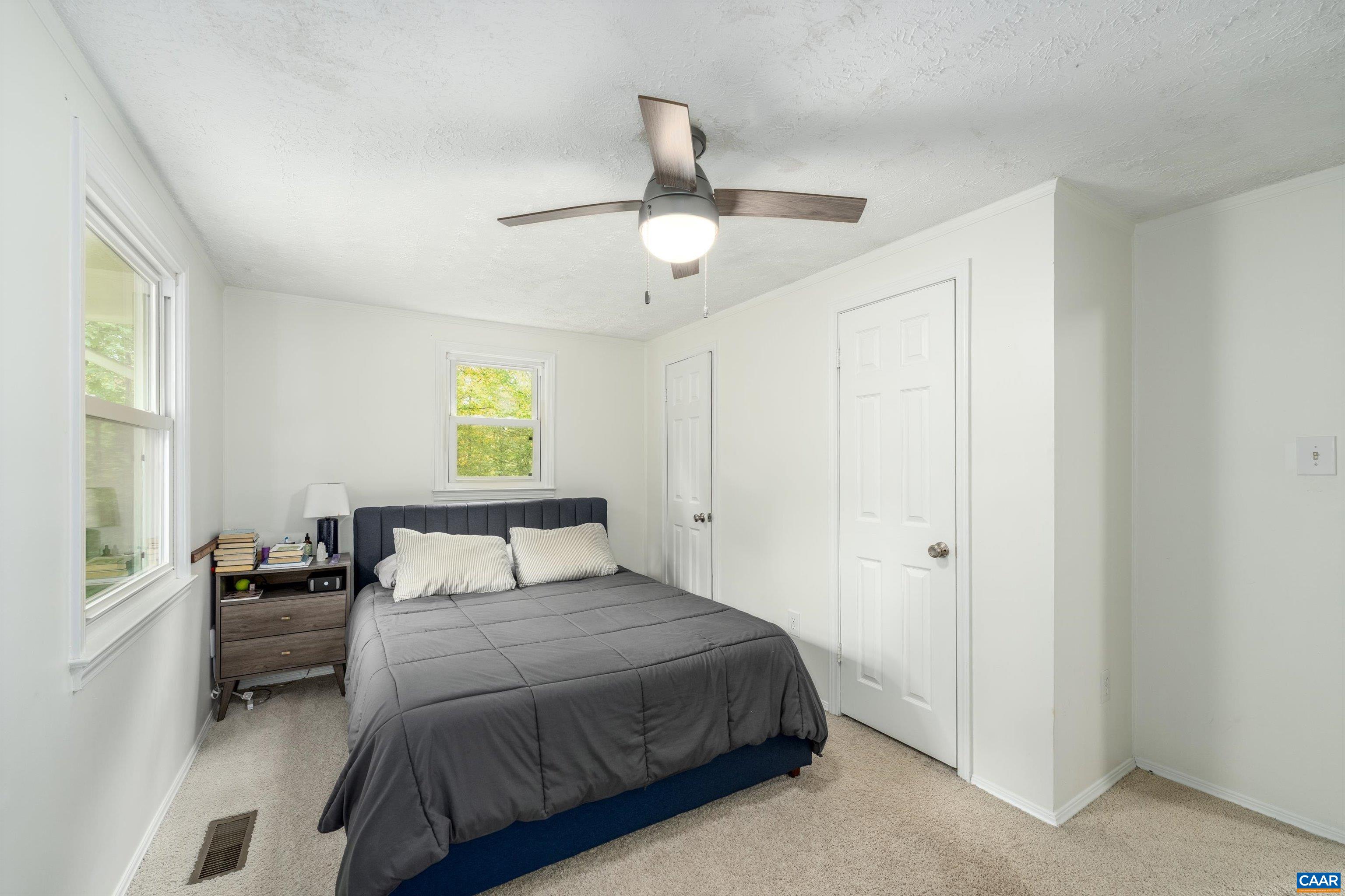 2833 Milton Road Charlottesville, VA 22902 - Photo 21 of 44 a bedroom with a bed and a window