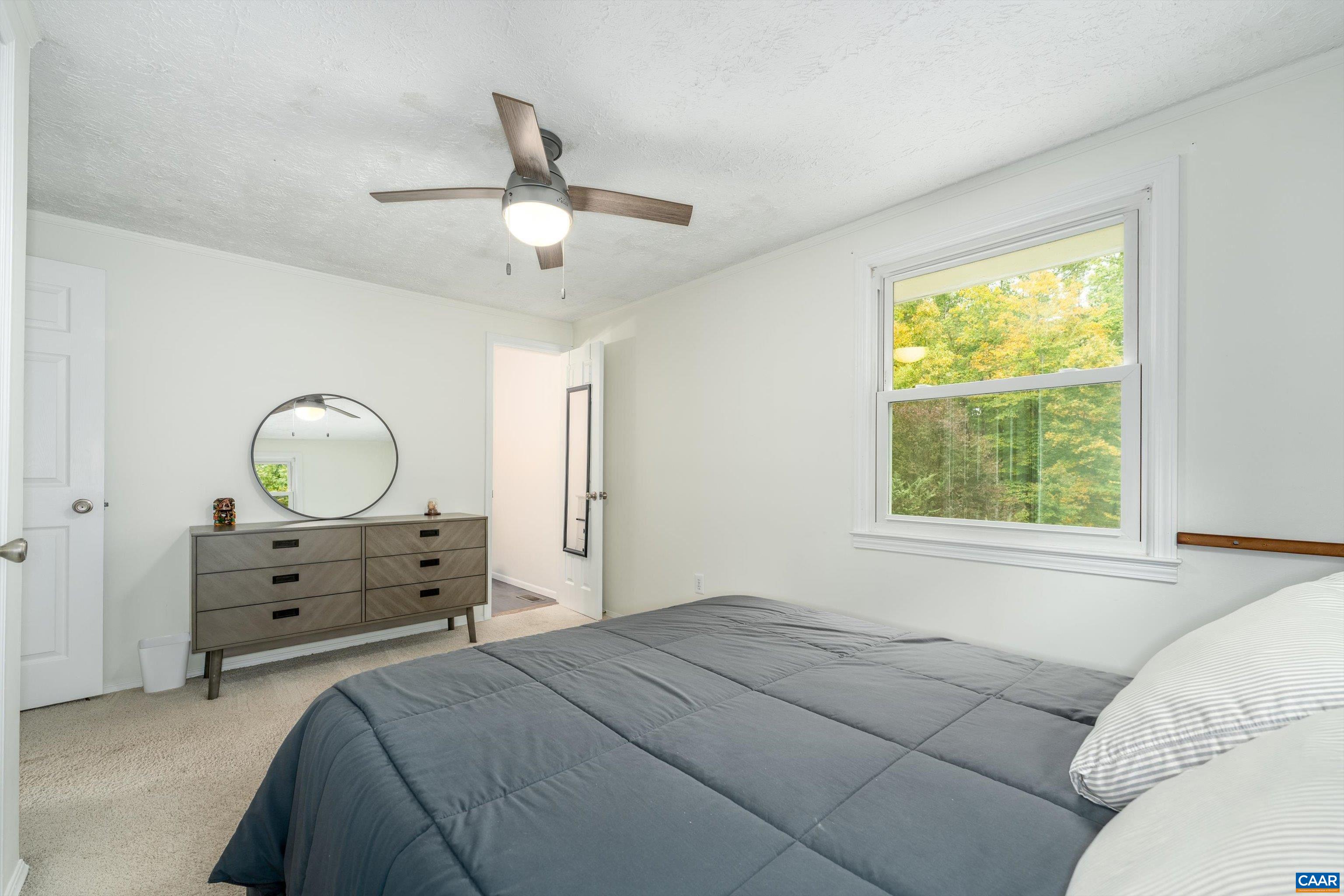 2833 Milton Road Charlottesville, VA 22902 - Photo 22 of 44 a bedroom with a bed and a window