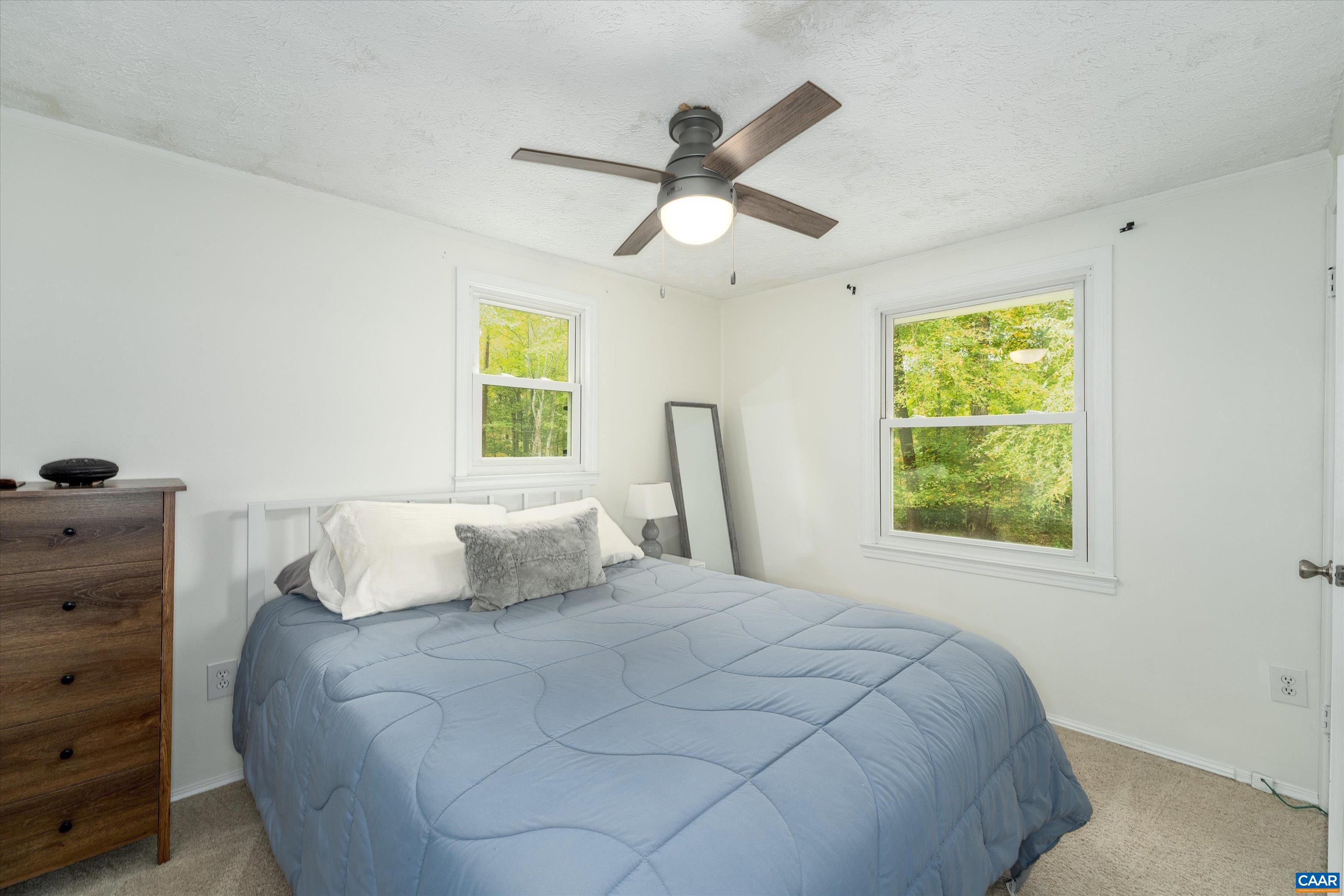2833 Milton Road Charlottesville, VA 22902 - Photo 27 of 44 a bedroom with a bed and a window