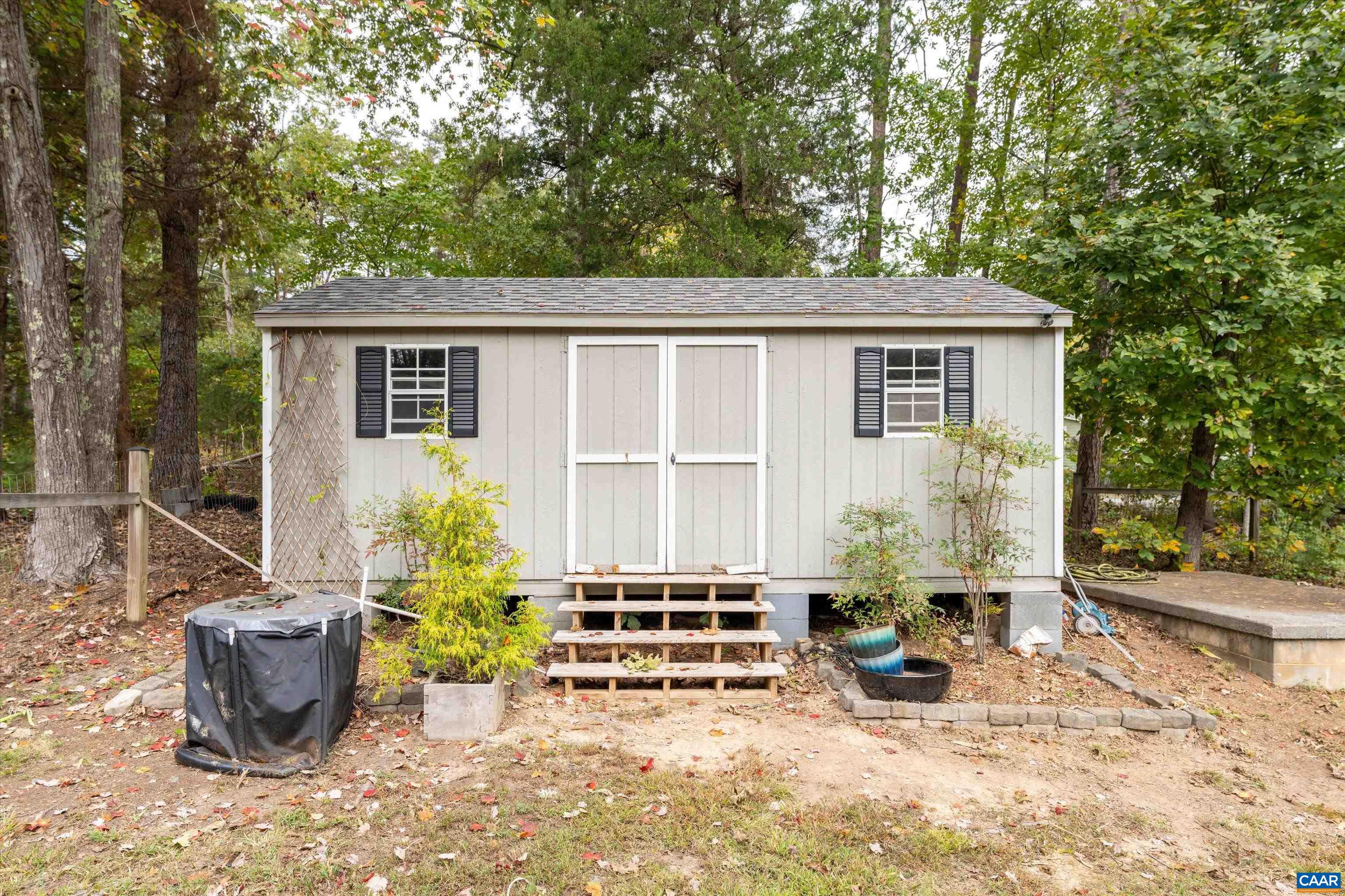 2833 Milton Road Charlottesville, VA 22902 - Photo 43 of 44 a view of backyard with outdoor seating and plants