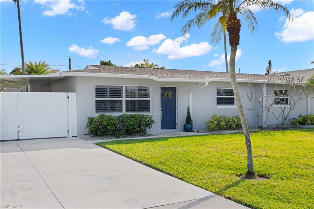 732 108th Avenue North Naples, FL 34108 - Photo 18 of 28 a view of a house with swimming pool