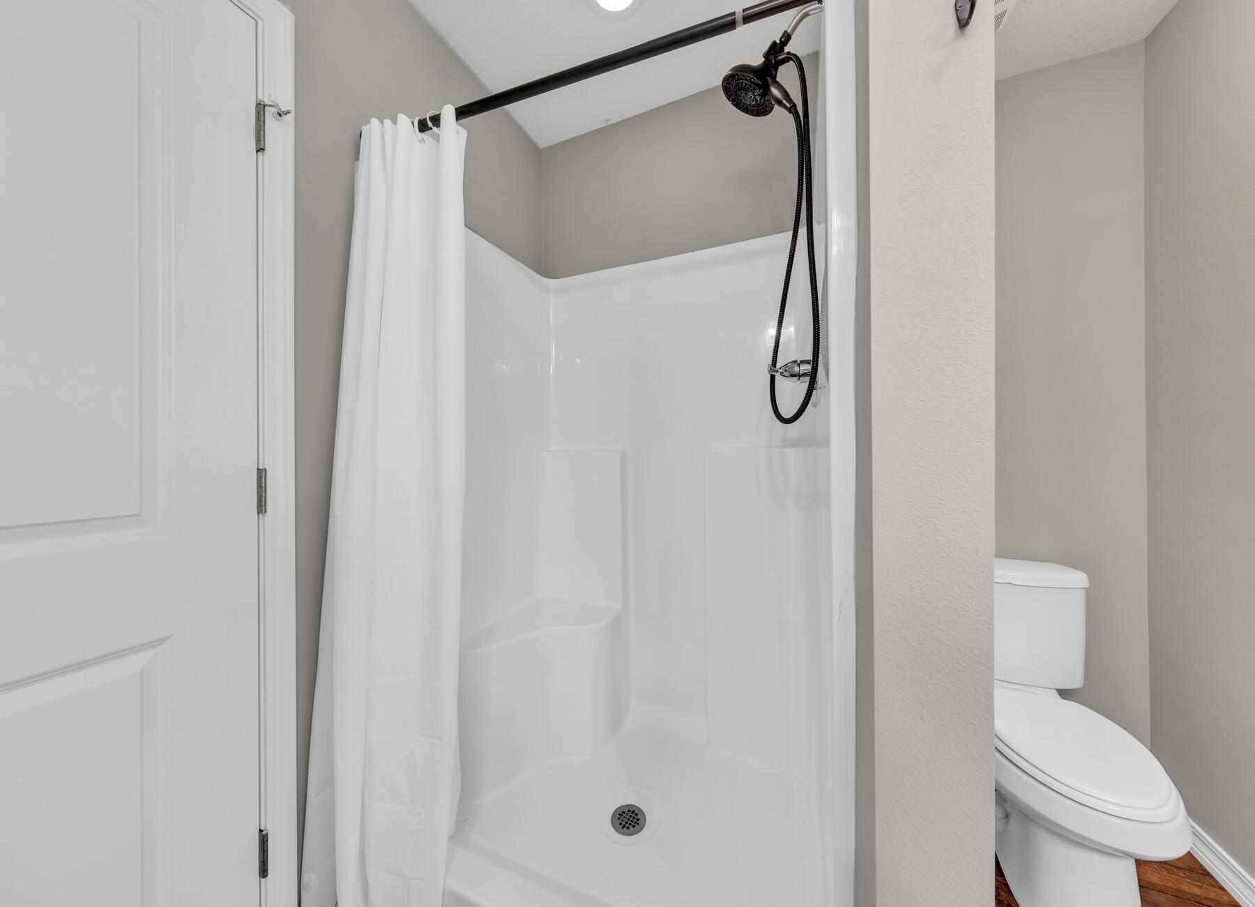 129 Fairway Drive Crestview, FL 32536 - Photo 17 of 30 a bathroom with a shower and toilet