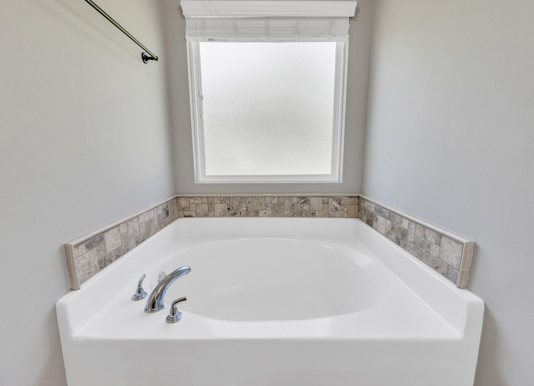 129 Fairway Drive Crestview, FL 32536 - Photo 18 of 30 a white bath tub sitting in a bathroom