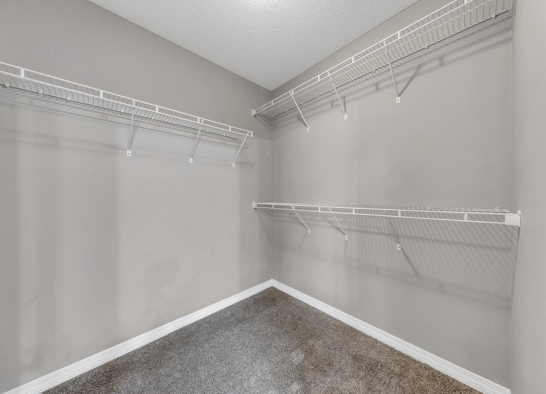 129 Fairway Drive Crestview, FL 32536 - Photo 19 of 30 a view of a room with racks on the wall