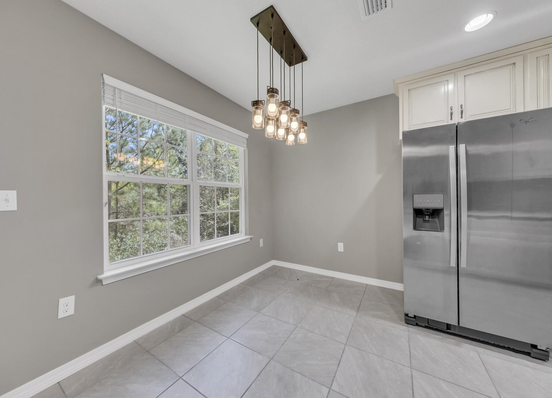 129 Fairway Drive Crestview, FL 32536 - Photo 6 of 30 a view of an empty room with a window