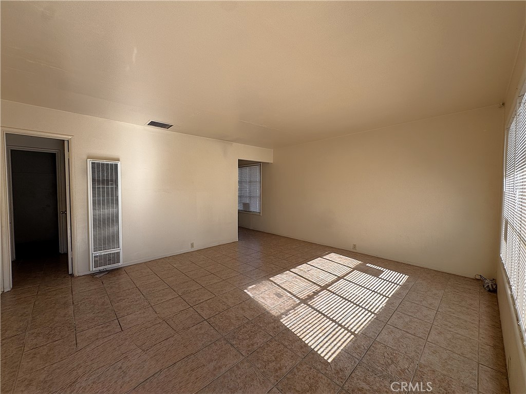 521 East Williams Street Barstow, CA 92311 - Photo 14 of 25 an empty room with an entryway