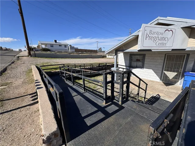 a view of a terrace with chairs