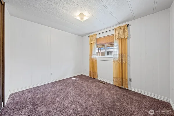 $75,000 | 1402 22nd Street Northeast, Unit 27, Auburn, WA 98002