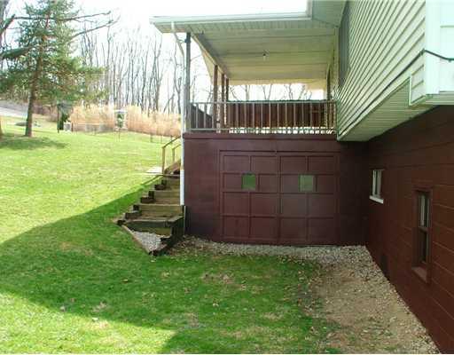 172 Potato Run Road Washington, PA 15301 - Photo 17 of 18 Other. Single garage accessible from the side yard ideal for equipment, storage or workshop!