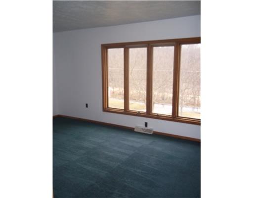172 Potato Run Road Washington, PA 15301 - Photo 3 of 18 Living Room. Great windows in the living room provide lots of light and a view of the countryside.