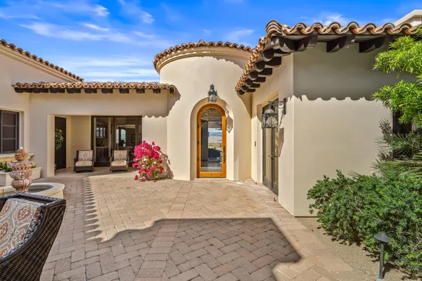 a kitchen with a sink cabinets and a stove