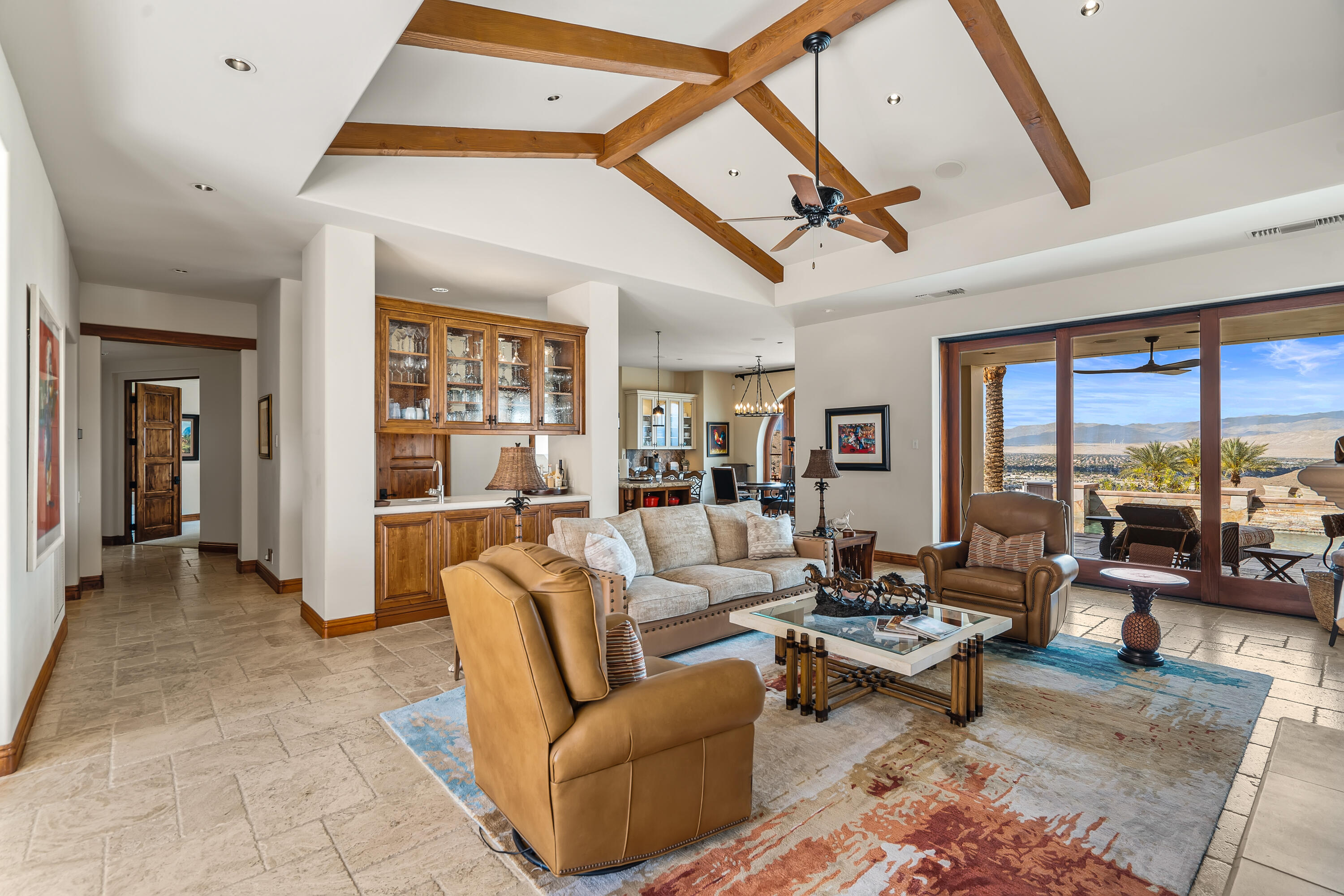 31 Hillcrest Drive Rancho Mirage, CA 92270 - Photo 19 of 82 a living room with furniture a rug and a large window