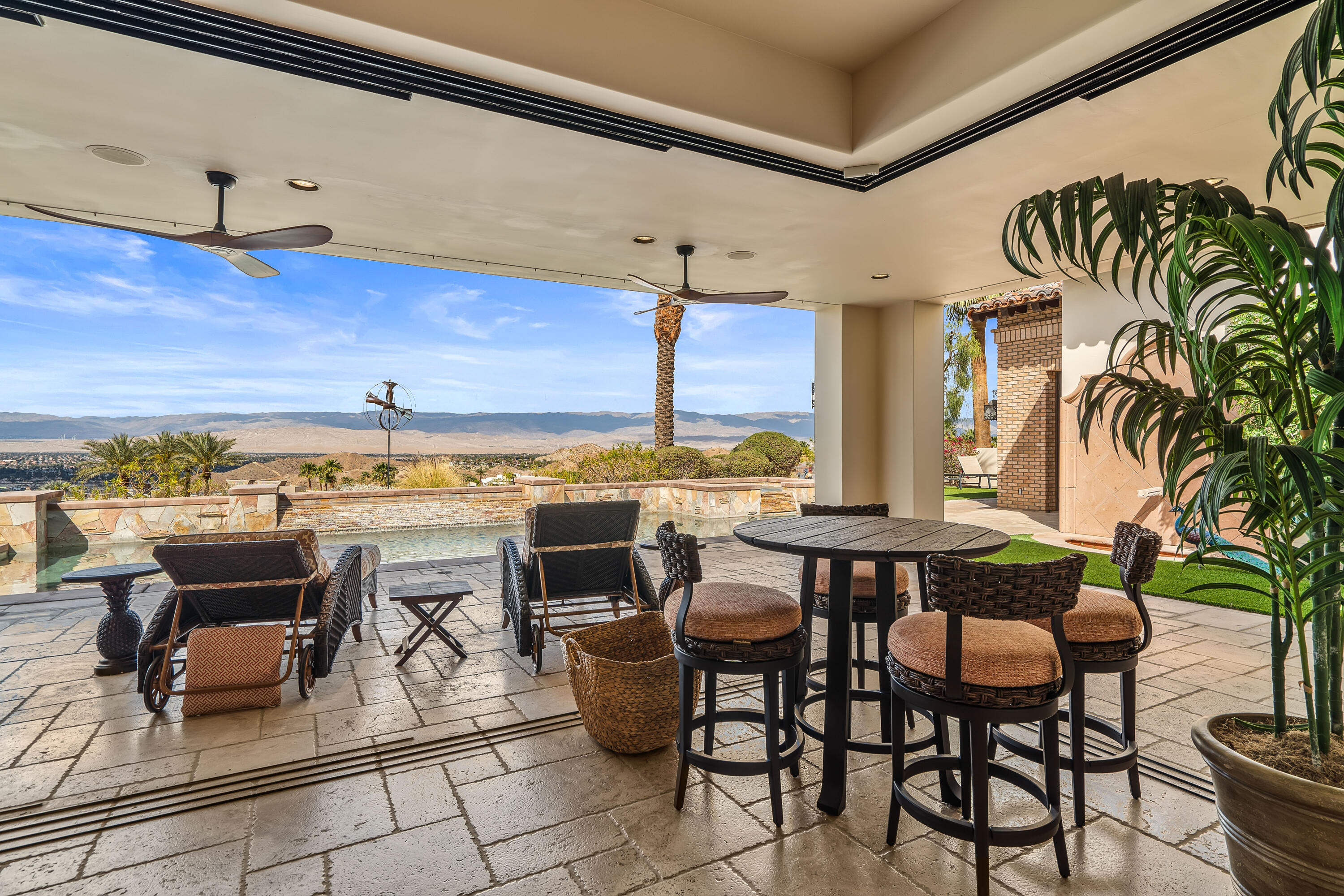 31 Hillcrest Drive Rancho Mirage, CA 92270 - Photo 23 of 82 a view of a tables and chairs in patio