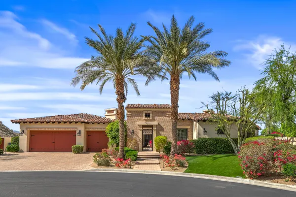 a view of a swimming pool with a garden