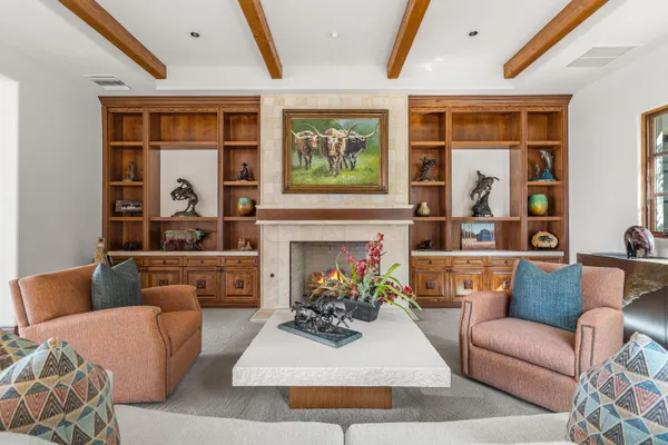 a spacious bathroom with a double vanity sink a mirror a bathtub and a shower