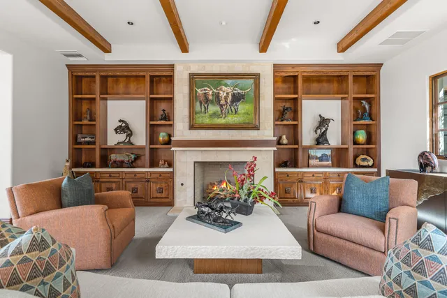 a spacious bathroom with a double vanity sink a mirror a bathtub and a shower