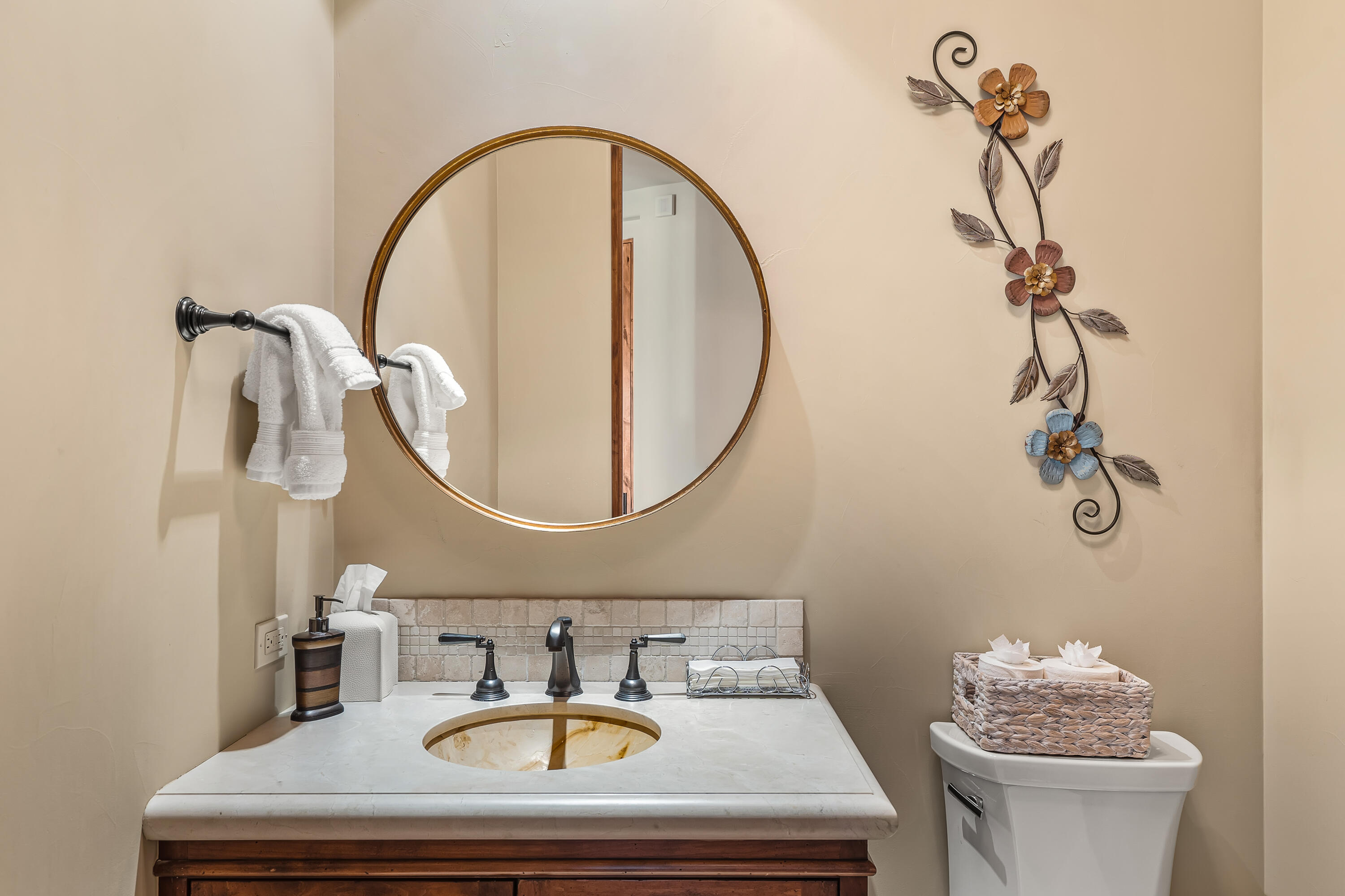 31 Hillcrest Drive Rancho Mirage, CA 92270 - Photo 39 of 82 a bathroom with a sink a mirror and a toilet