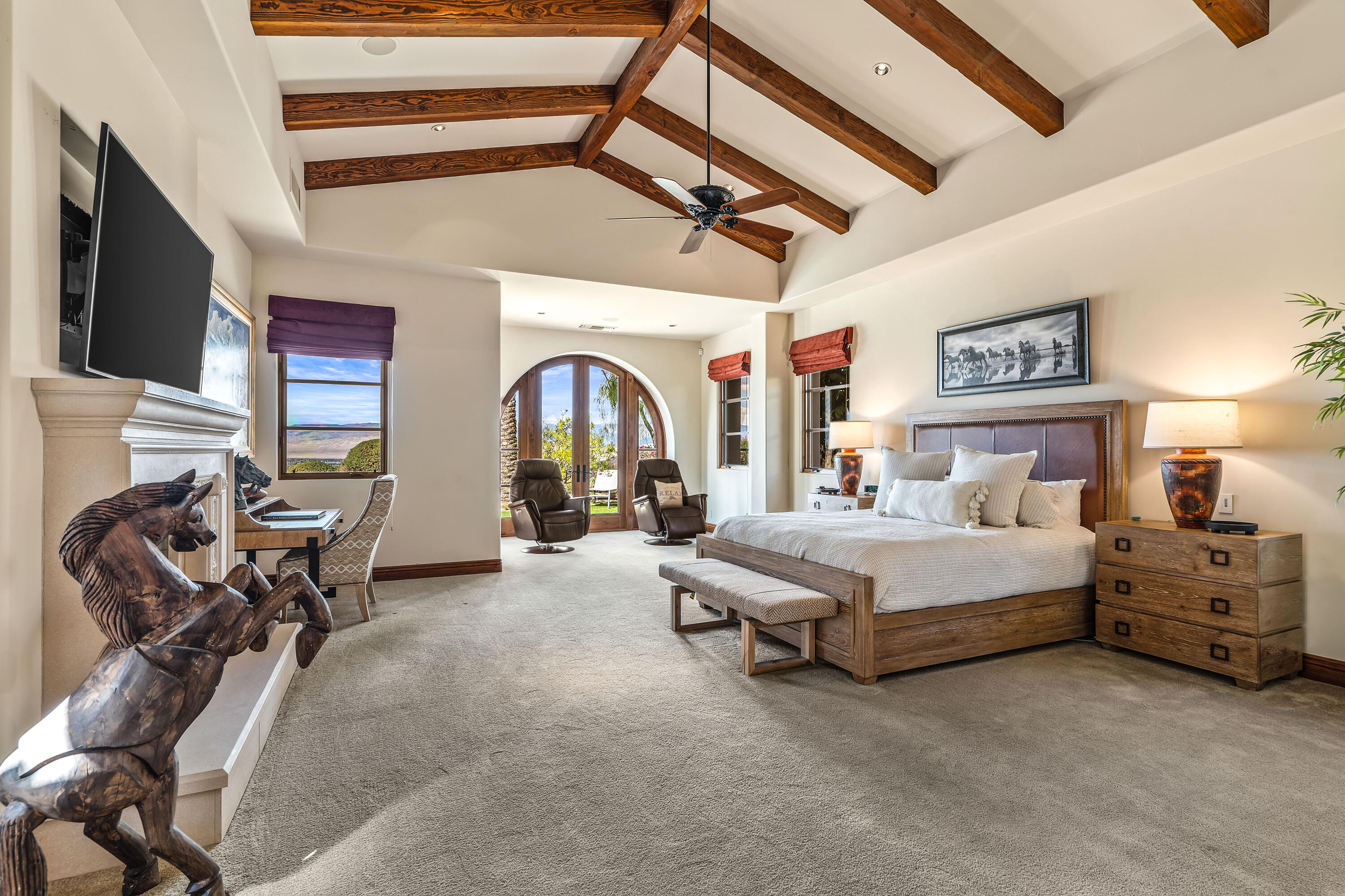 31 Hillcrest Drive Rancho Mirage, CA 92270 - Photo 40 of 82 a spacious bedroom with bed and a large mirror on the dresser